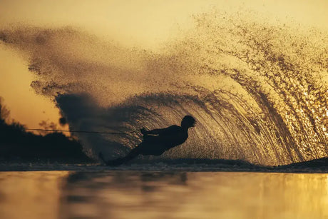 Man slaloming at sunrise